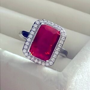 Faux ruby and diamond silver tone ring